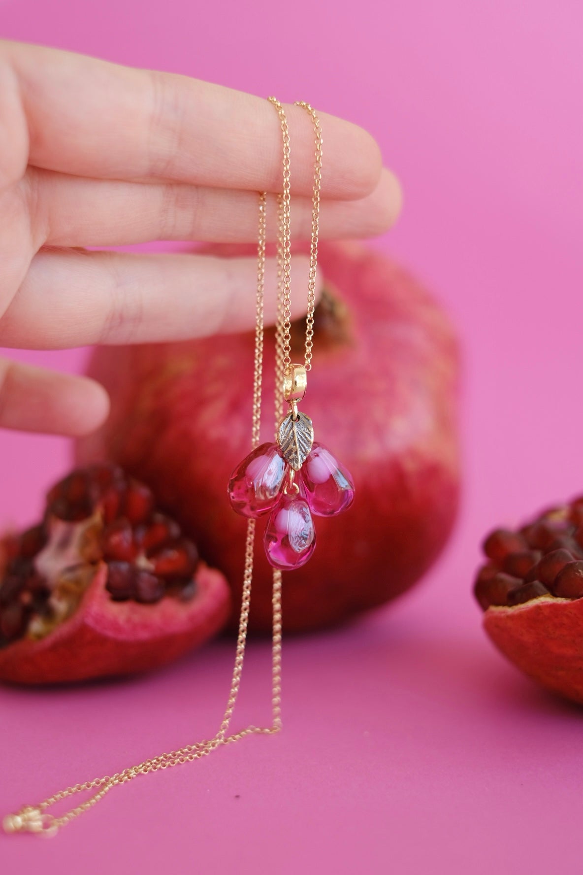 Lampwork murano glass pomegranate seed pendant (pink glass)