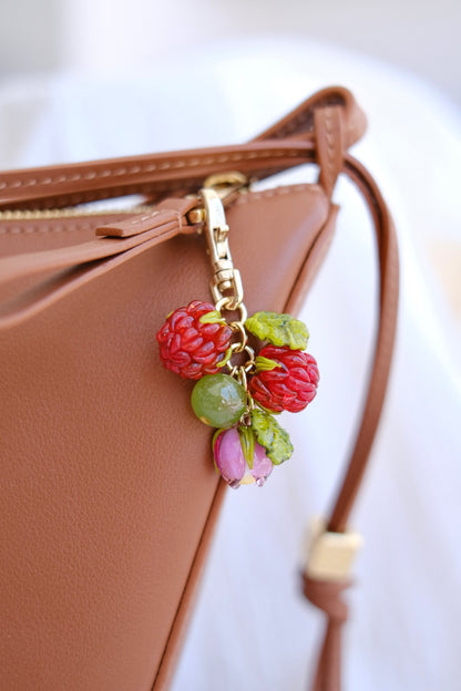 Murano glass raspberry bag charm