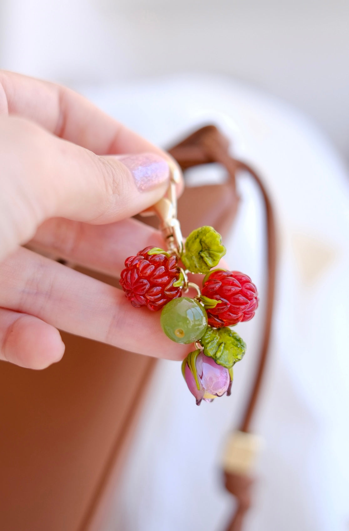 Murano glass raspberry bag charm