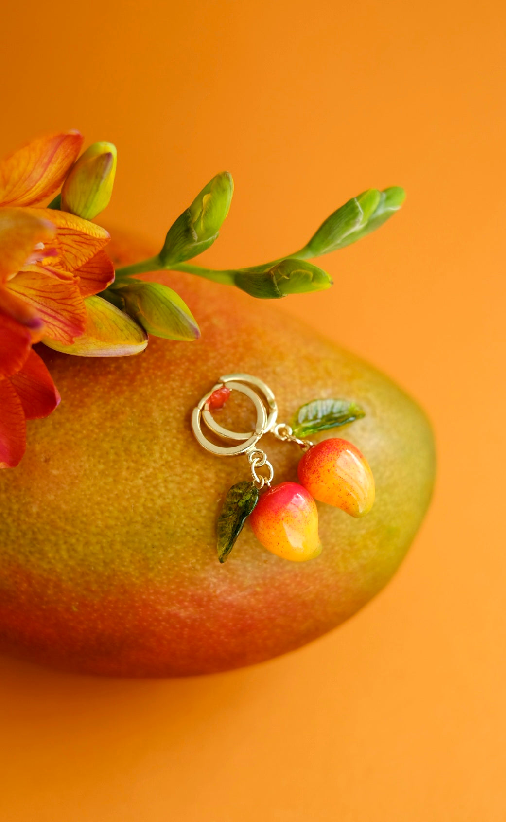 Mango lampwork glass hoop earrings