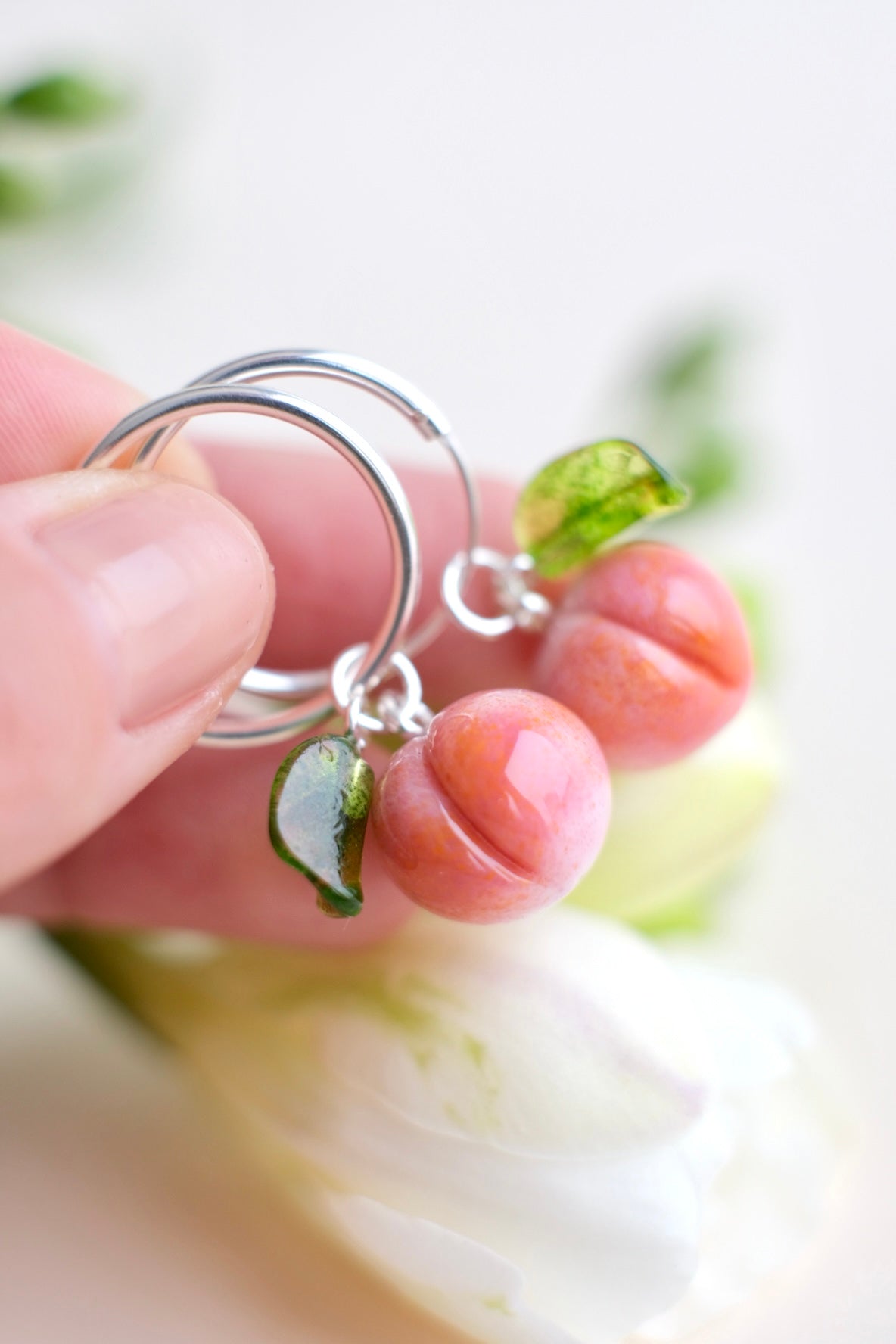 Lampwork glass peach earrings on silver hoops