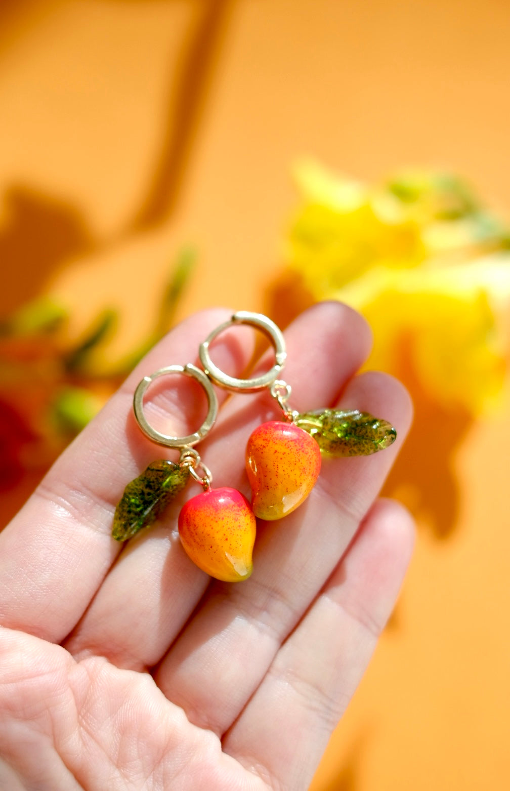 Mango lampwork glass hoop earrings