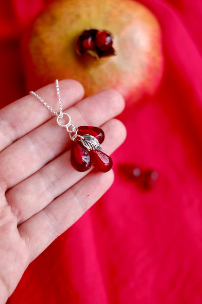 Lampwork murano glass pomegranate seed pendant