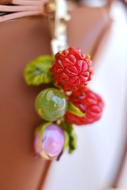 Murano glass raspberry bag charm