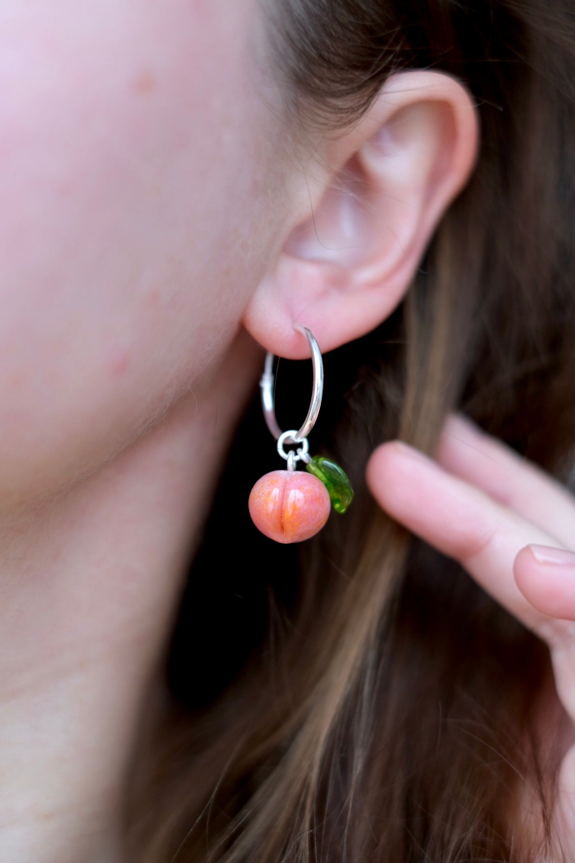 Lampwork glass peach earrings on silver hoops