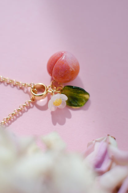 Peach fruit lampwork glass pendant