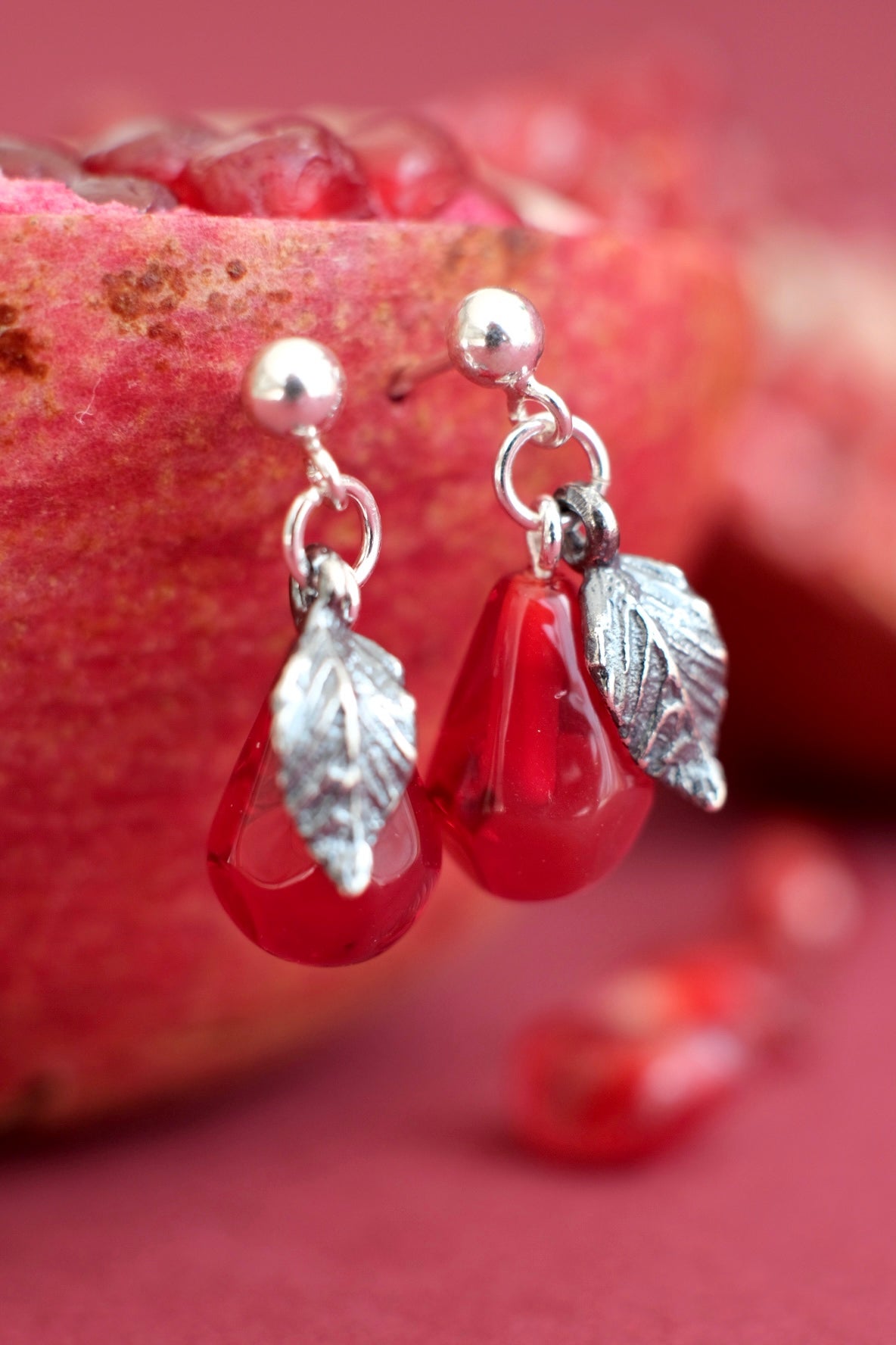 Murano glass pomegranate seed silver stud earrings