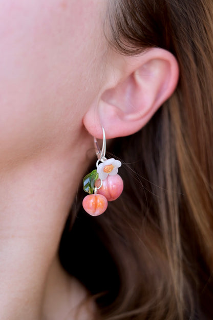 Murano glass peach earrings