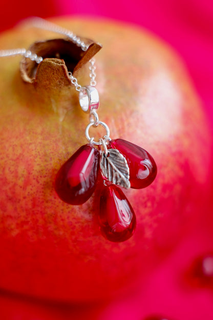 Lampwork murano glass pomegranate seed pendant