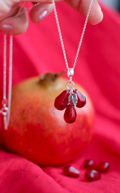 Lampwork murano glass pomegranate seed pendant