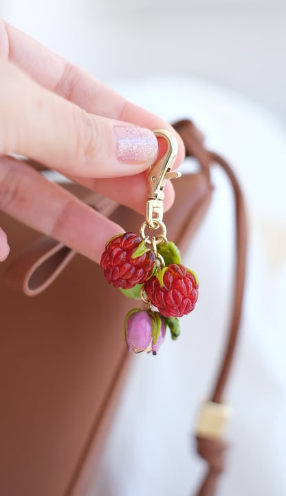 Murano glass raspberry bag charm
